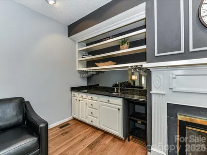 a kitchen with stainless steel appliances granite countertop a stove and a microwave