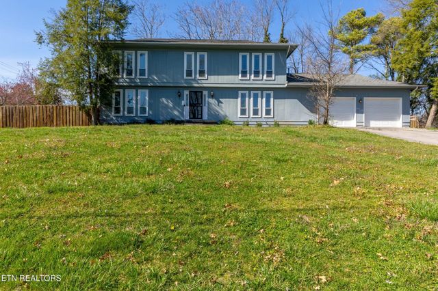 a view of a house with a swimming pool
