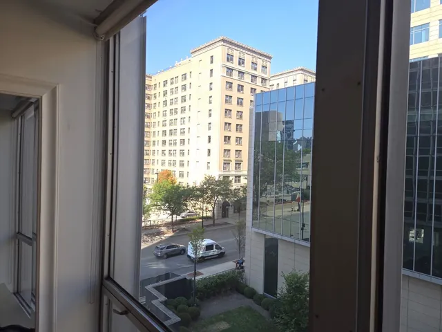 a room with open glass windows