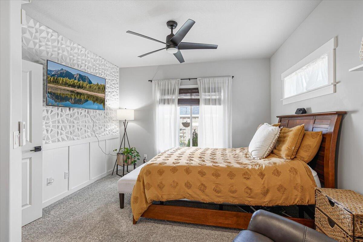 248 Christopher Way Talent, OR 97540 - Photo 13 of 33 a bed sitting in a bedroom next to a window