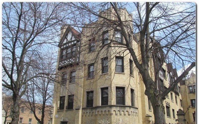 a view of a building with a snow