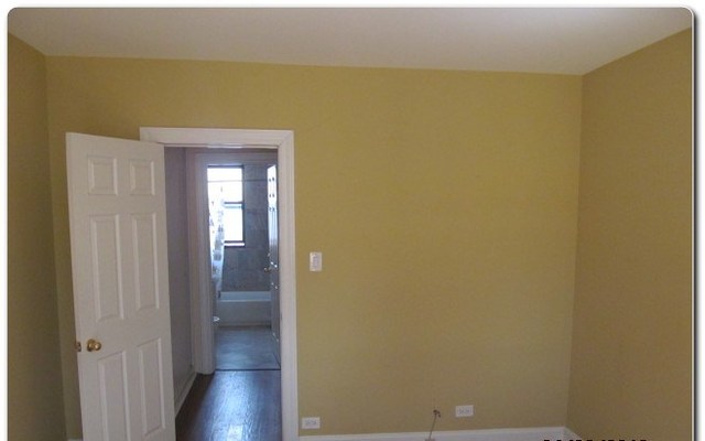 5655 North Spaulding Avenue, Unit 2W Chicago, IL 60659 - Photo 9 of 13 a view of a closet in a room