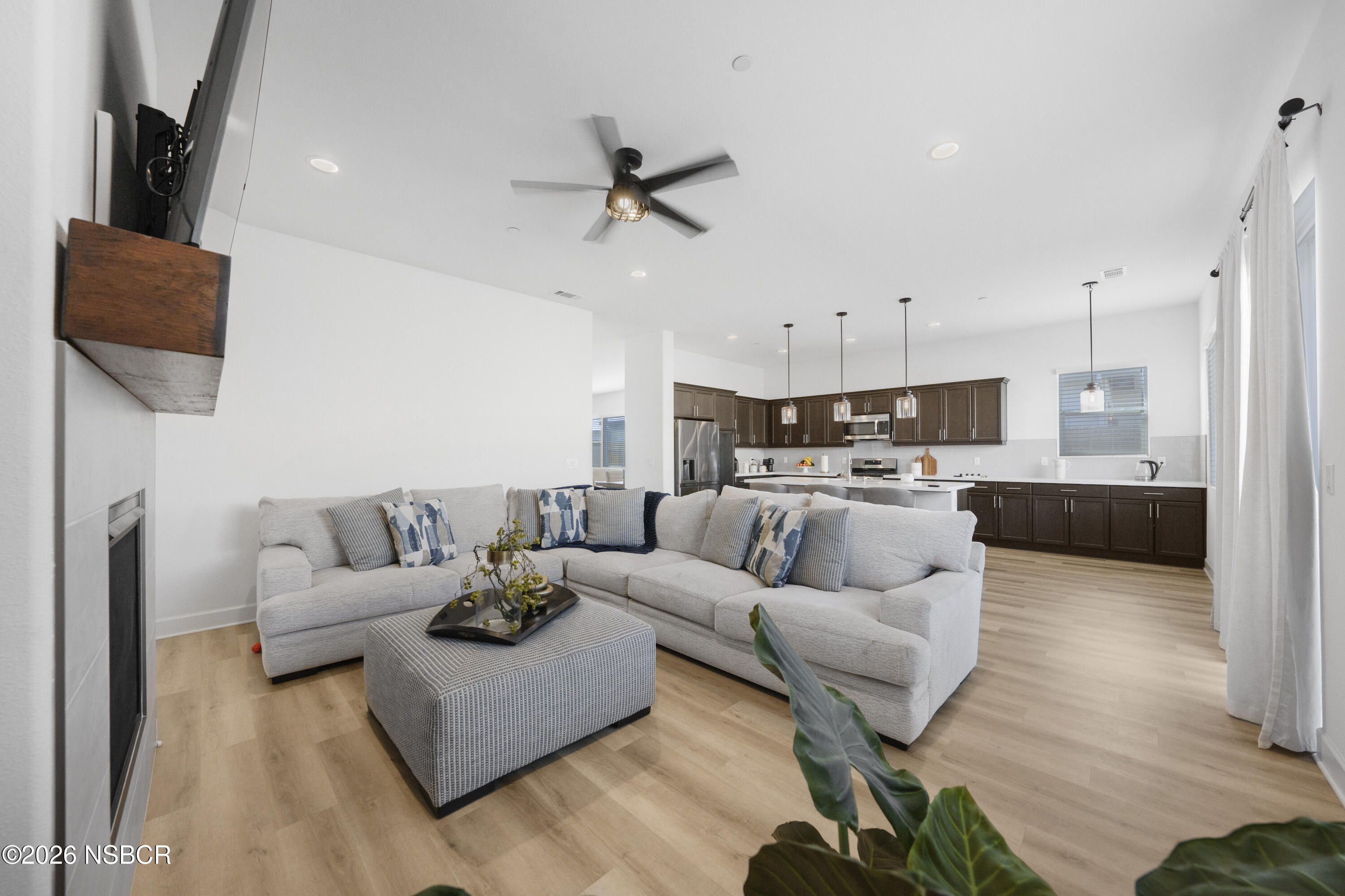 751 Skyview Lane Santa Maria, CA 93455 - Photo 6 of 31 a living room with furniture and a wooden floor