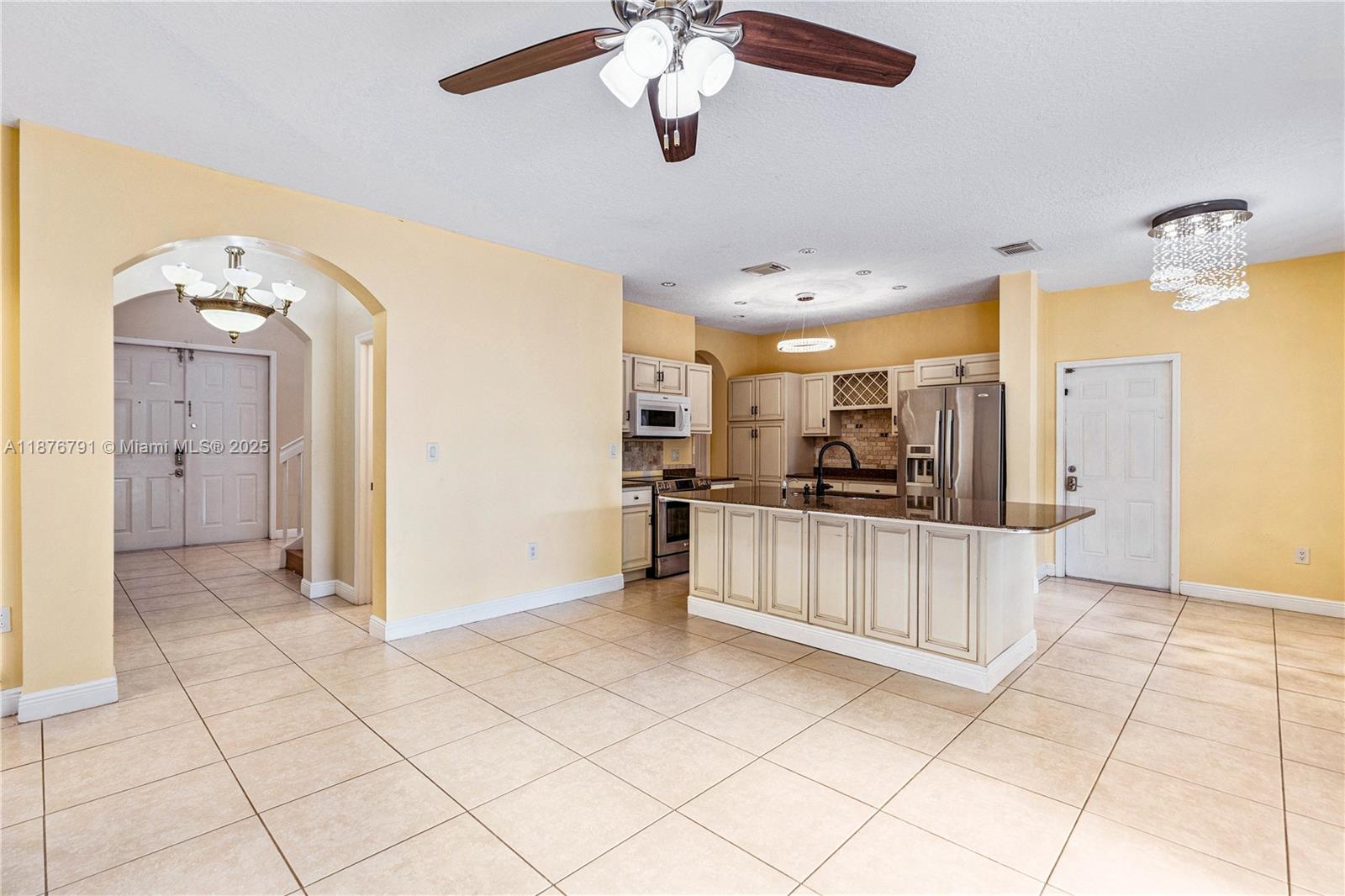 20235 Southwest 129th Avenue, Unit 20235 Miami, FL 33177 - Photo 11 of 35 a view of kitchen with windows