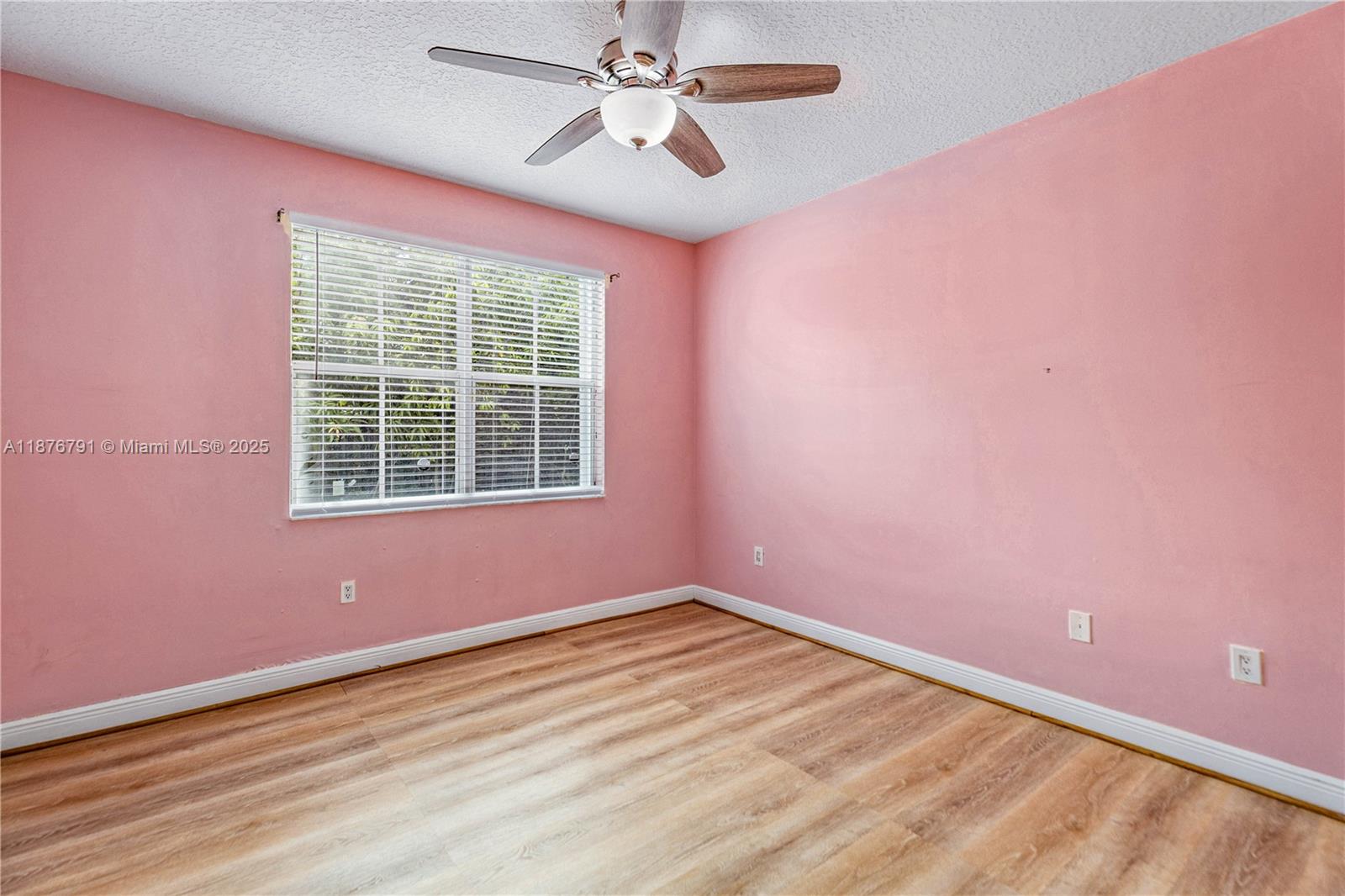 20235 Southwest 129th Avenue, Unit 20235 Miami, FL 33177 - Photo 15 of 35 a view of empty room with ceiling fan