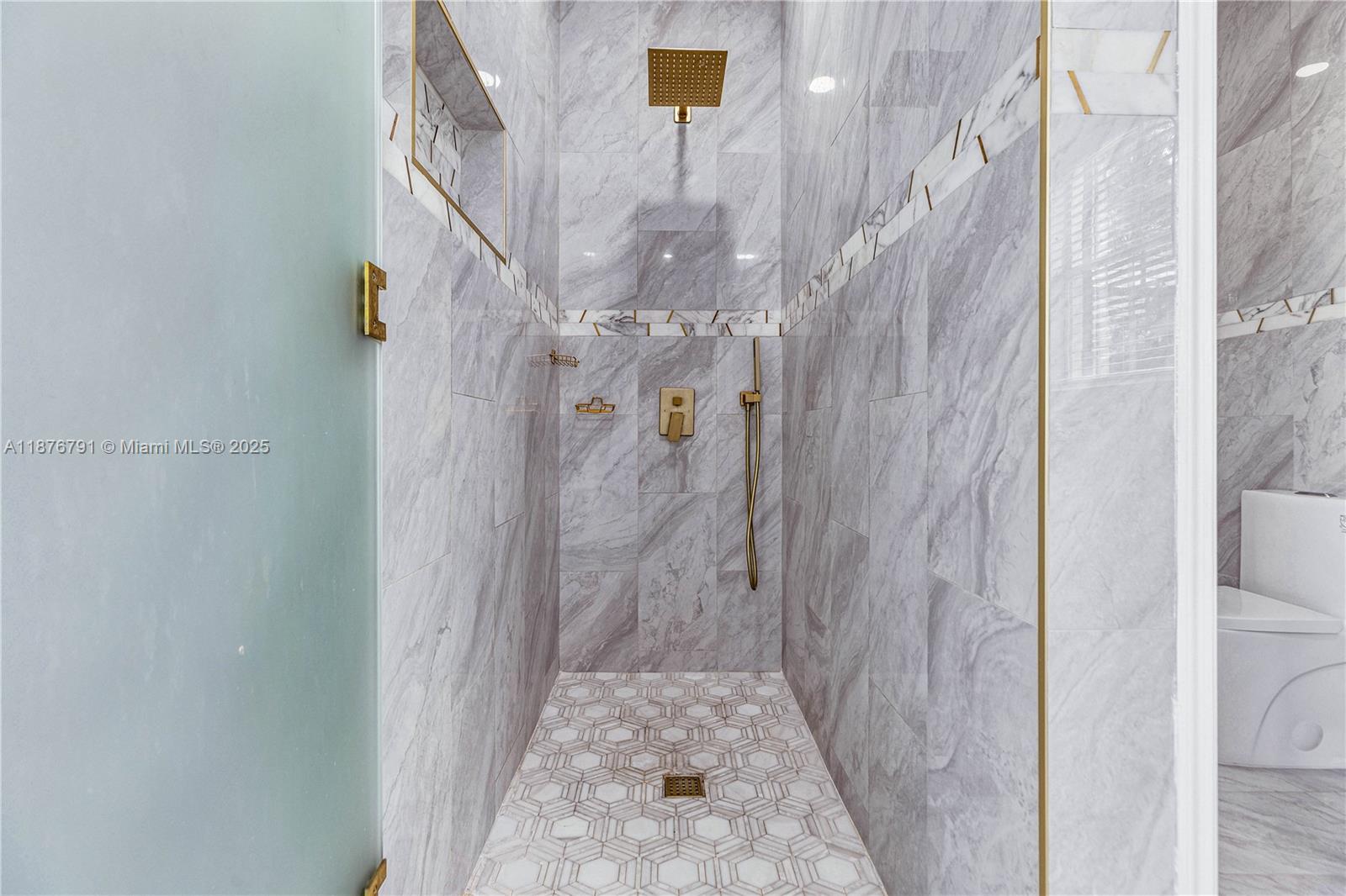 20235 Southwest 129th Avenue, Unit 20235 Miami, FL 33177 - Photo 25 of 35 a bathroom with a shower