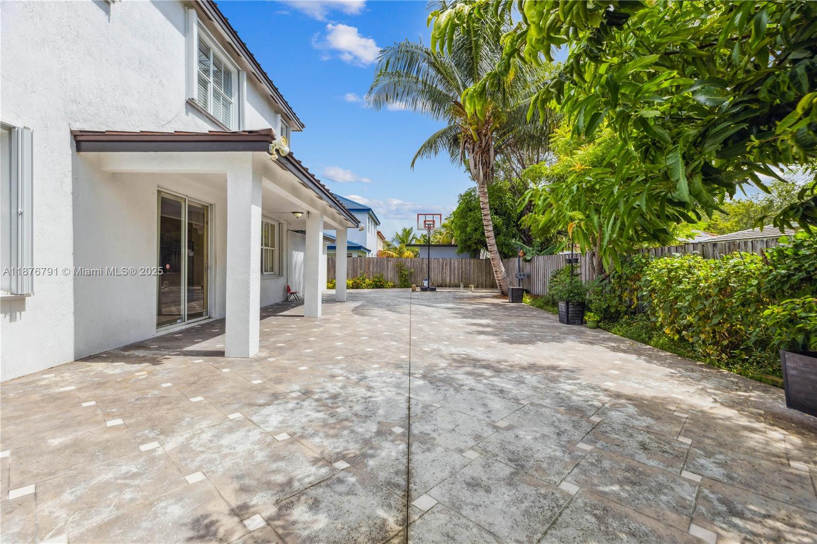 20235 Southwest 129th Avenue, Unit 20235 Miami, FL 33177 - Photo 33 of 35 a view of a house with a yard