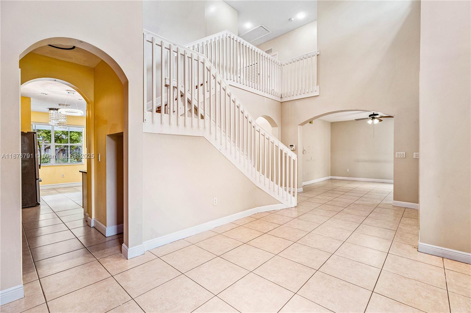 20235 Southwest 129th Avenue, Unit 20235 Miami, FL 33177 - Photo 9 of 35 a view of a hallway with entryway door
