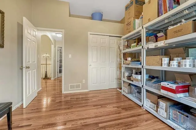 a workspace with furniture and window