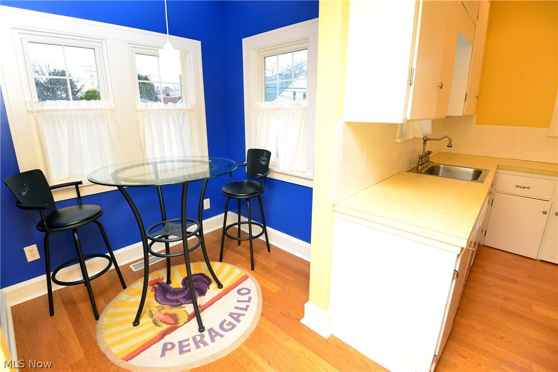 15629 Munn Road Cleveland, OH 44111 - Photo 6 of 24 Bright Breakfast rm off the Kitchen allows for additional seating options..A spacious & convenient Mudd is located on the left w/newer storm & interior drs..