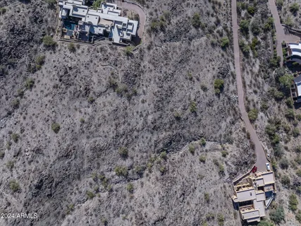 a aerial view of a house with a yard