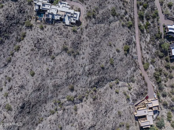 a aerial view of a house with a yard