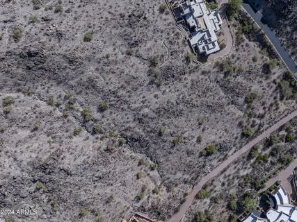 an aerial view of residential house and green space