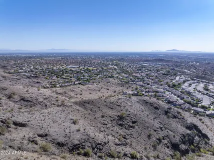 an aerial view of residential house and outdoor space