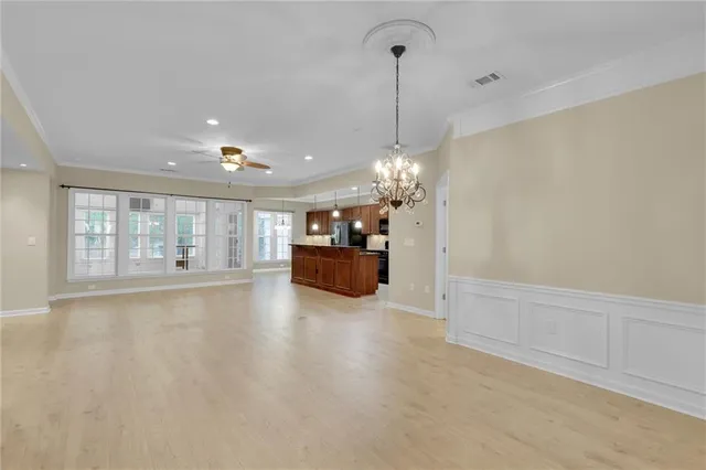 a view of a kitchen with a sink and a window
