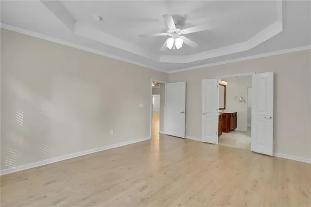 a view of a bathroom from a hallway