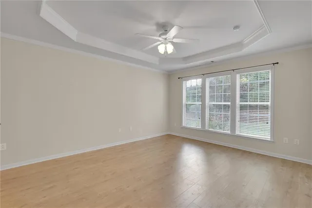 a bedroom with a bed and a mirror