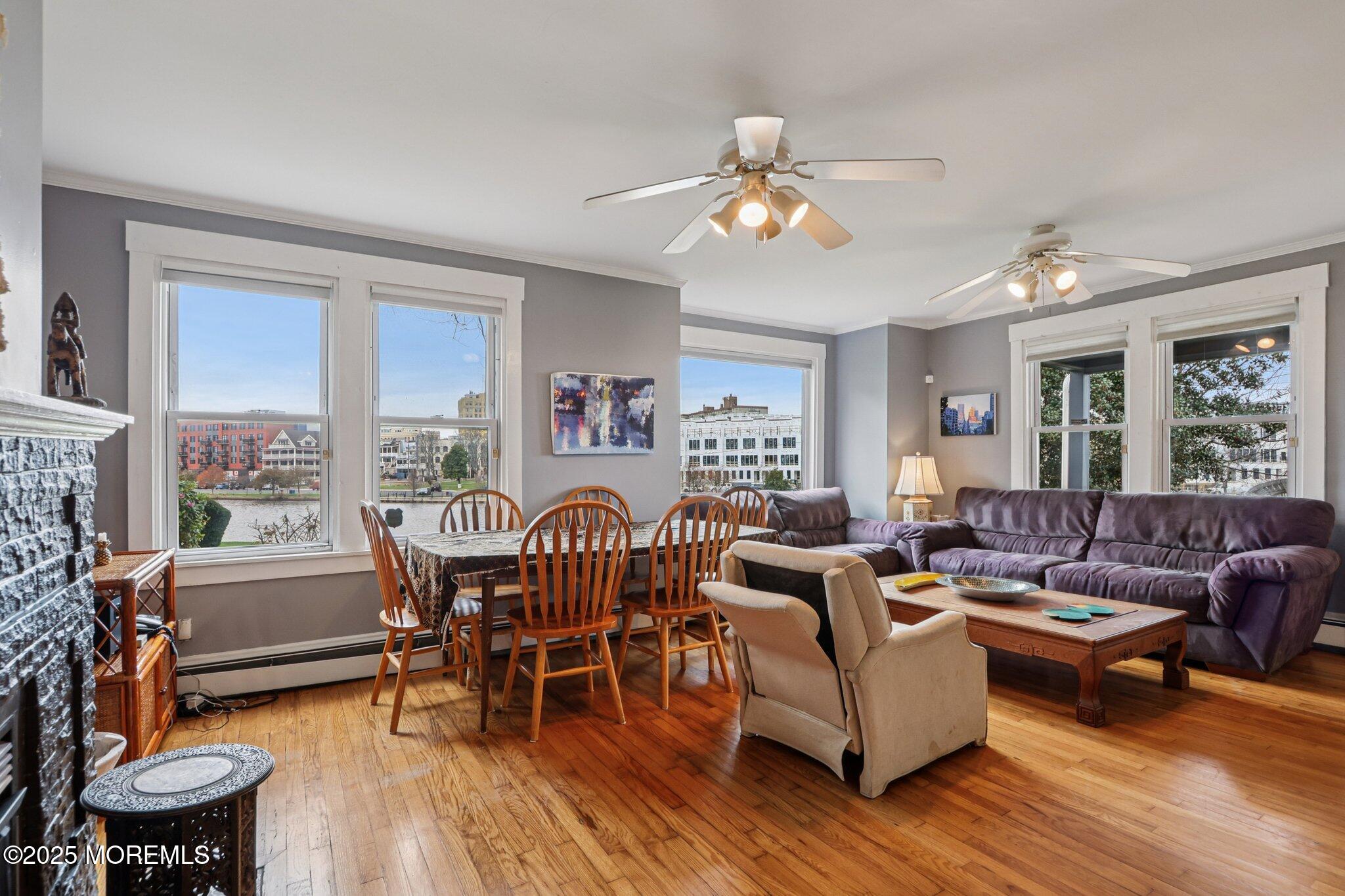 60 Lake Avenue Ocean Grove, NJ 07756 - Photo 12 of 66 a living room with furniture and wooden floor