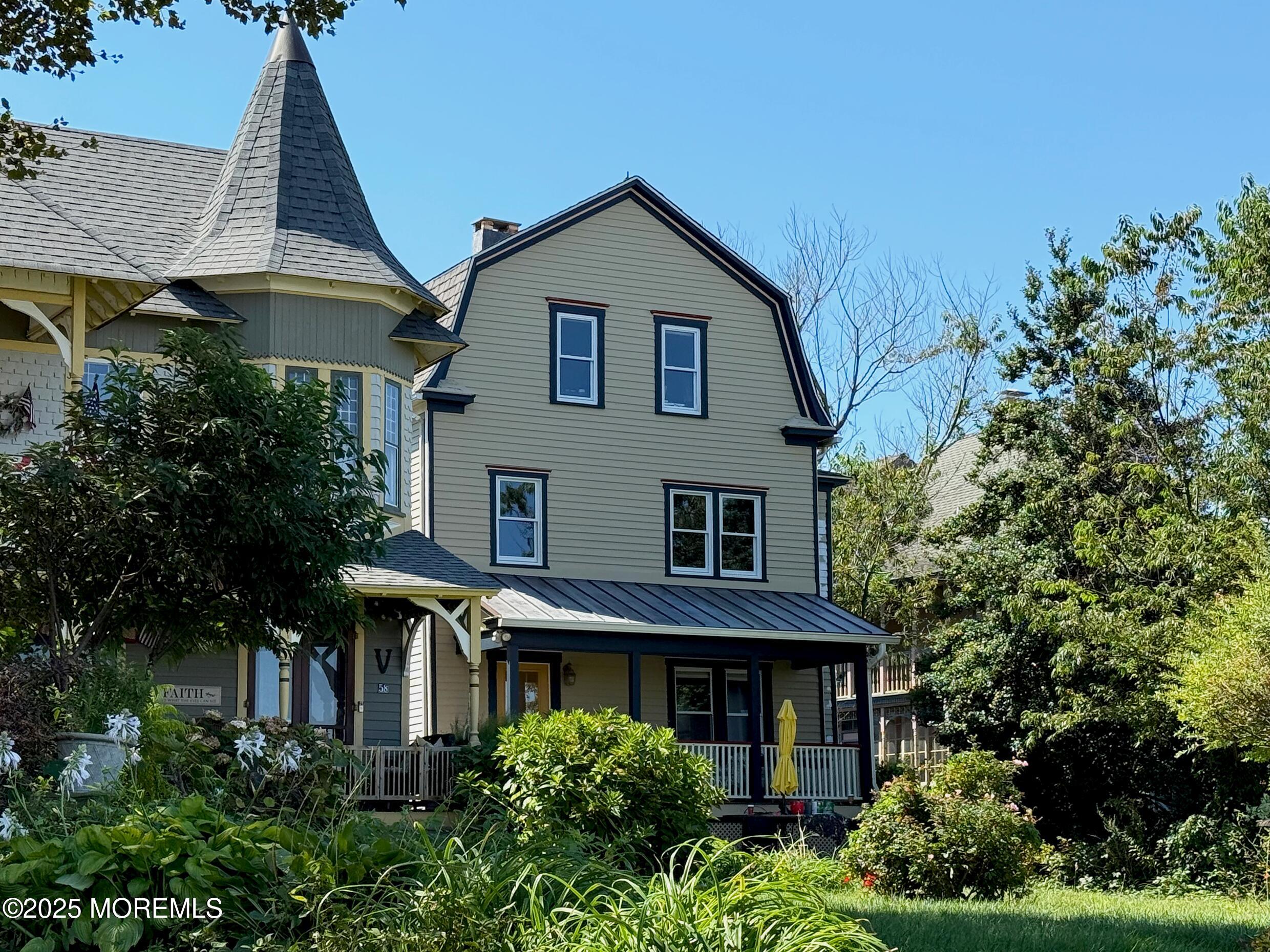 60 Lake Avenue Ocean Grove, NJ 07756 - Photo 2 of 66 a aerial view of a house with a yard and potted plants