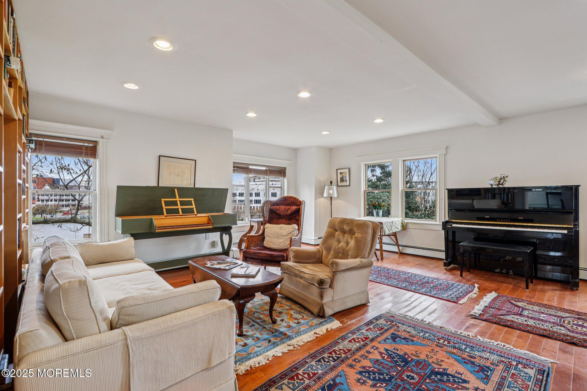 60 Lake Avenue Ocean Grove, NJ 07756 - Photo 23 of 66 a living room with furniture and a piano