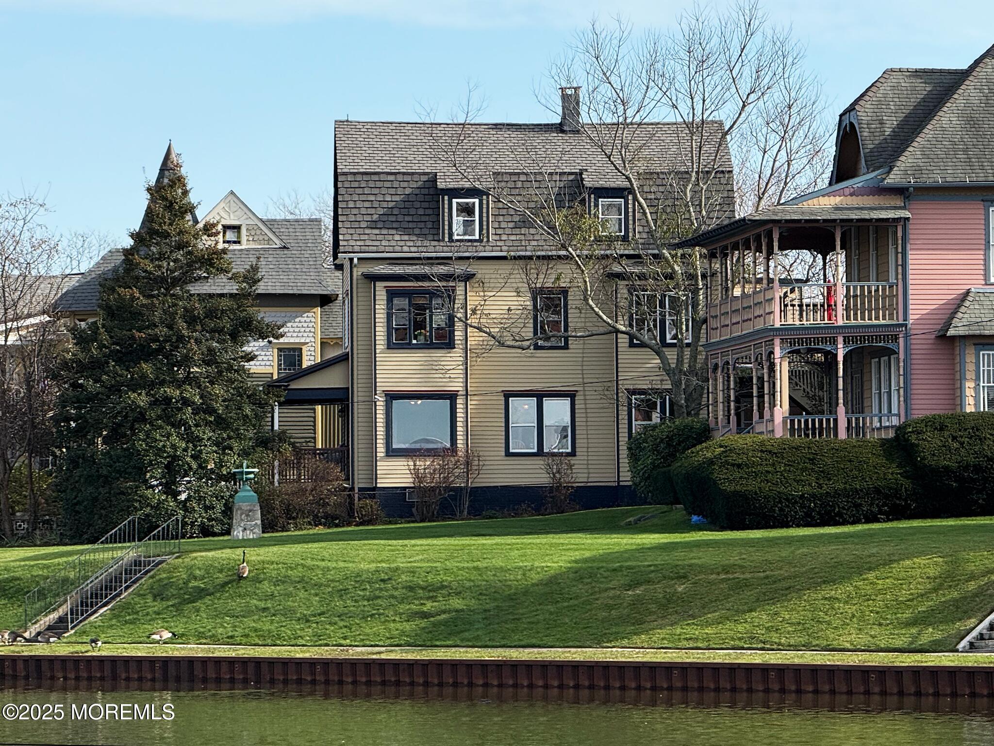 60 Lake Avenue Ocean Grove, NJ 07756 - Photo 3 of 66 a view of a house with a garden