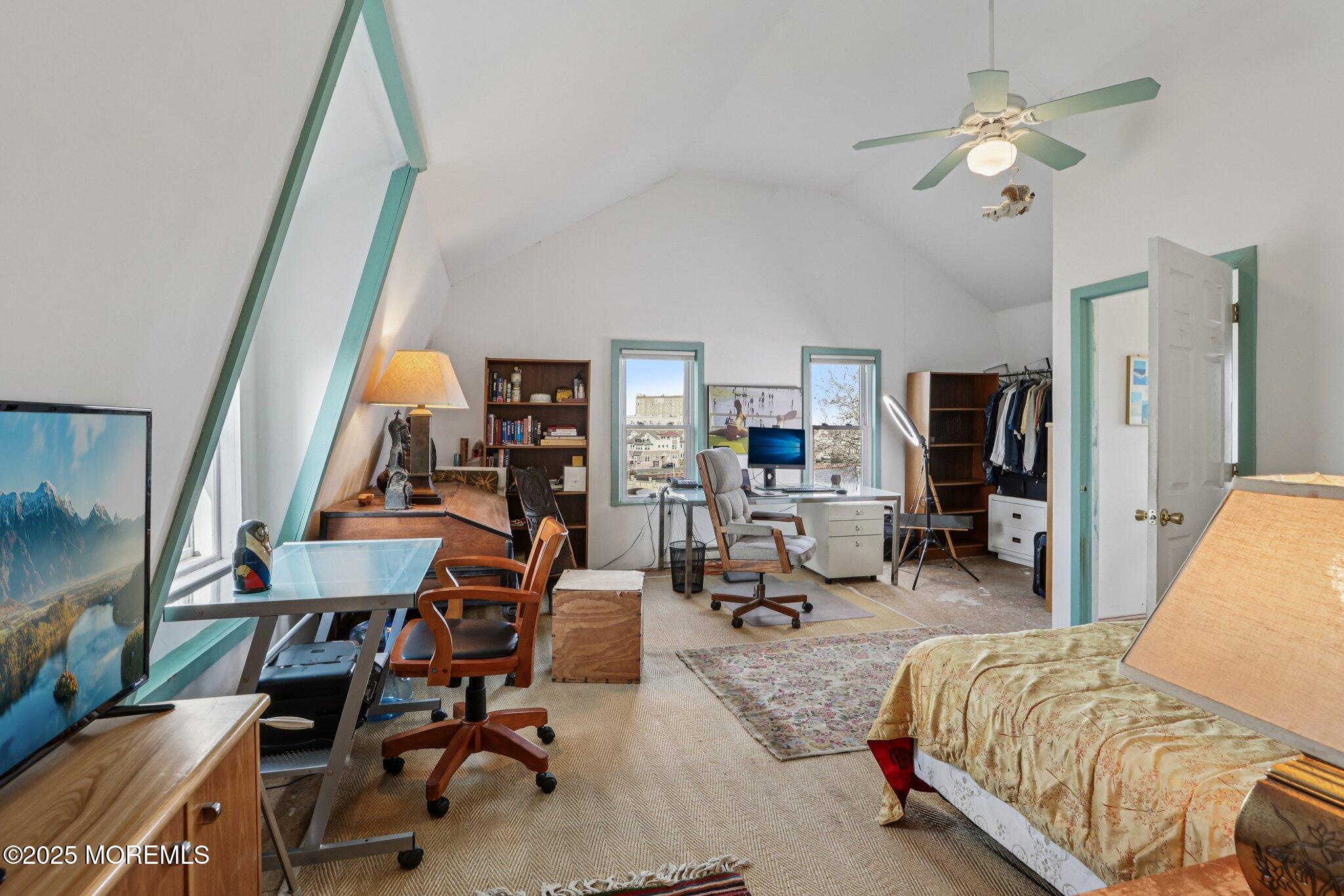 60 Lake Avenue Ocean Grove, NJ 07756 - Photo 38 of 66 a living room with furniture kitchen view and a chandelier