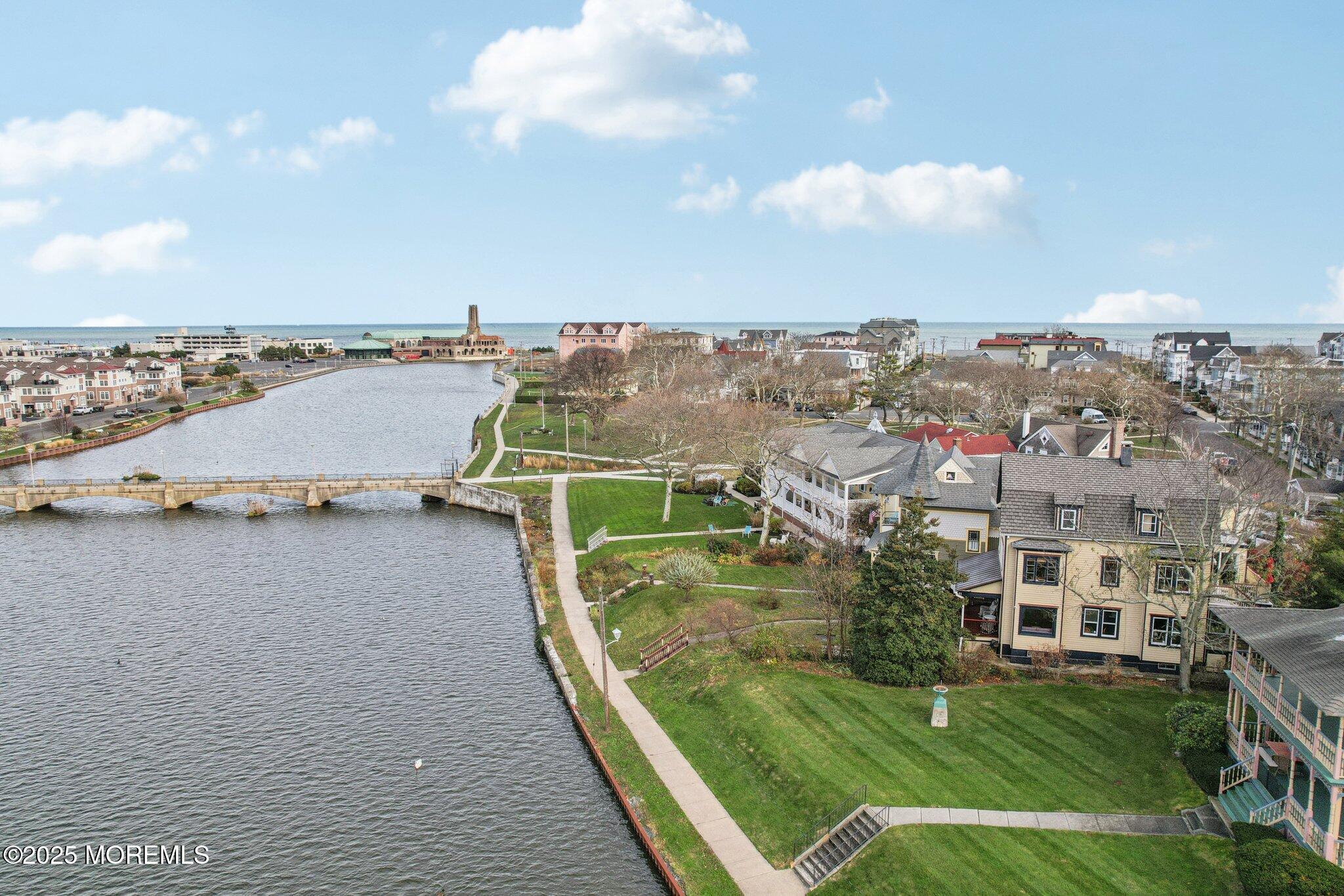 60 Lake Avenue Ocean Grove, NJ 07756 - Photo 50 of 66 a view of a lake with a terrace