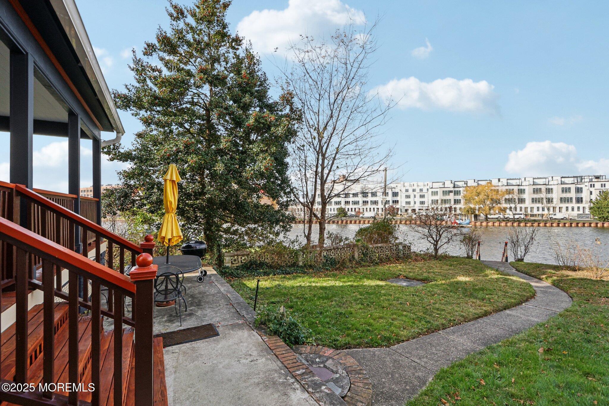 60 Lake Avenue Ocean Grove, NJ 07756 - Photo 5 of 66 a view of a backyard with sitting area