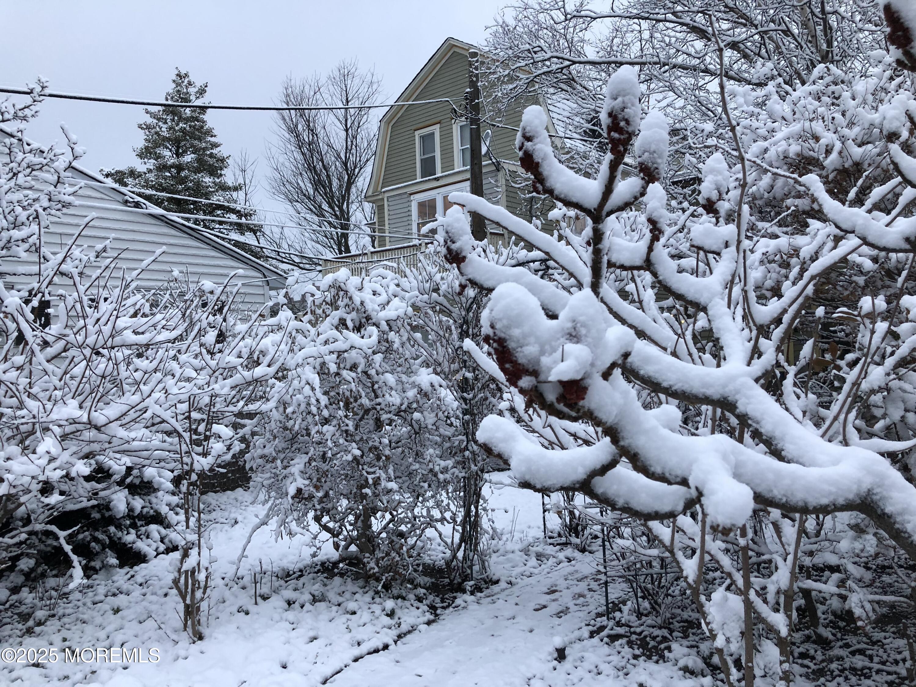 60 Lake Avenue Ocean Grove, NJ 07756 - Photo 65 of 66 a view of a chairs and table in a yard