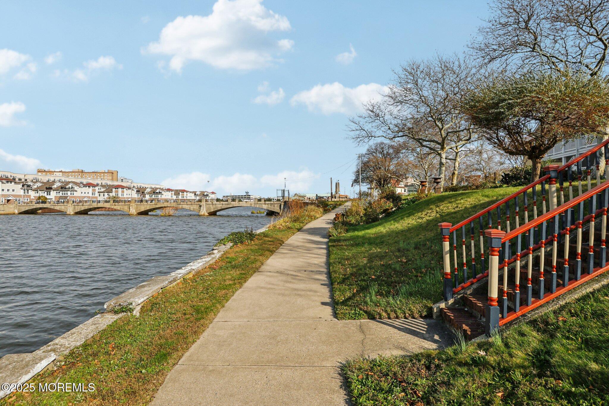 60 Lake Avenue Ocean Grove, NJ 07756 - Photo 7 of 66 a view of a pathway both side of building