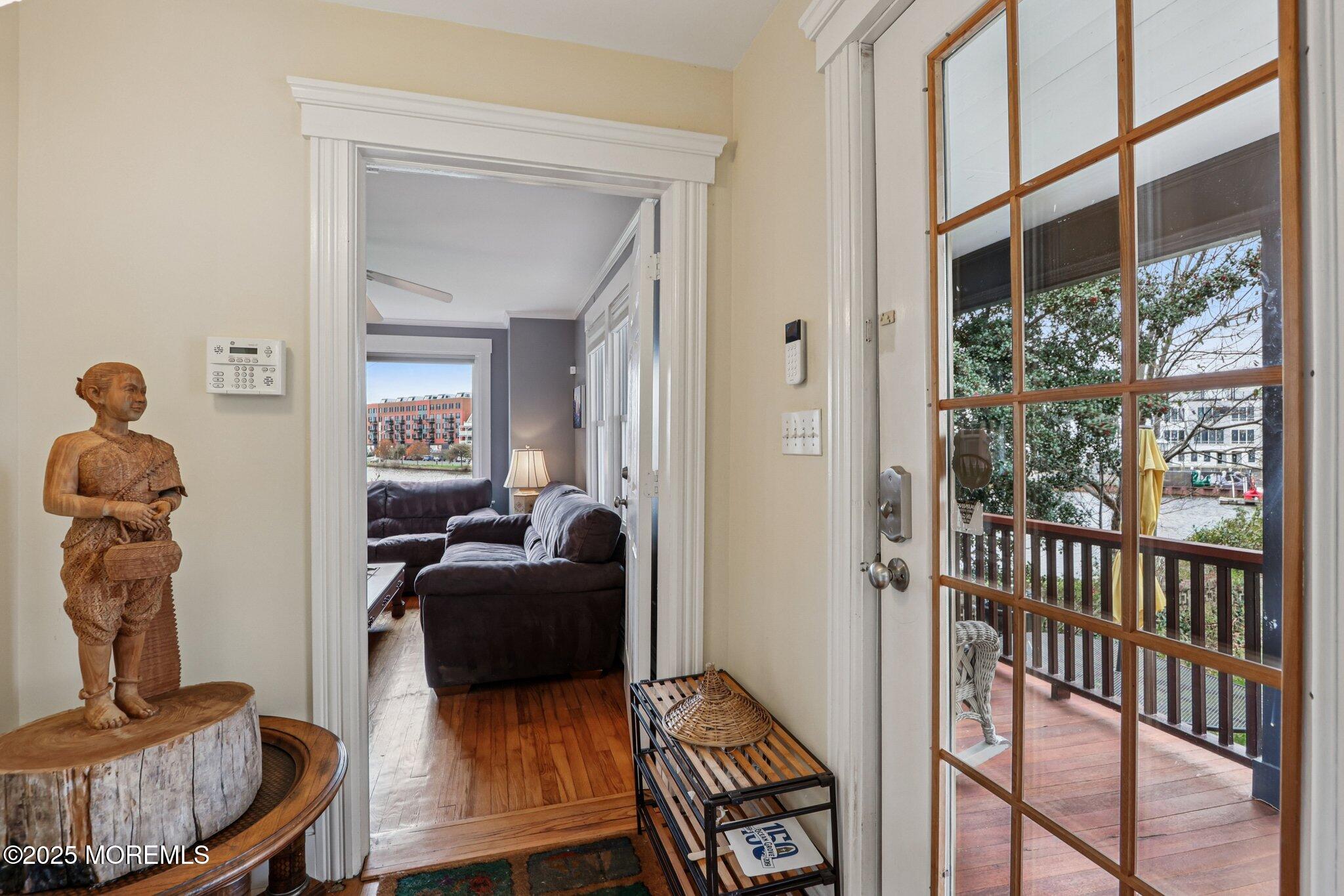 60 Lake Avenue Ocean Grove, NJ 07756 - Photo 8 of 66 a living room with furniture and a window