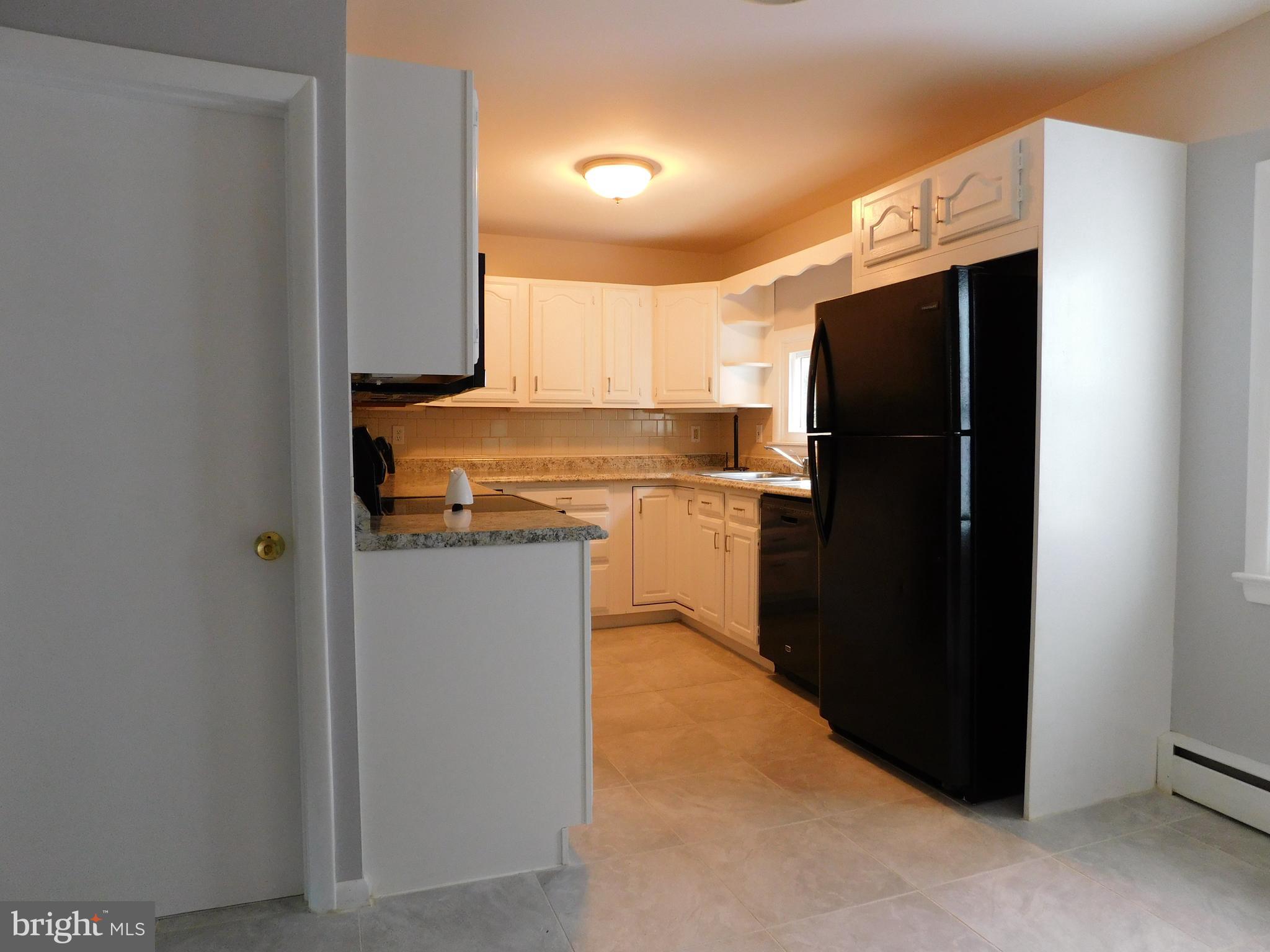 2432 Shuresville Road Darlington, MD 21034 - Photo 8 of 38 Kitchen and door to basement