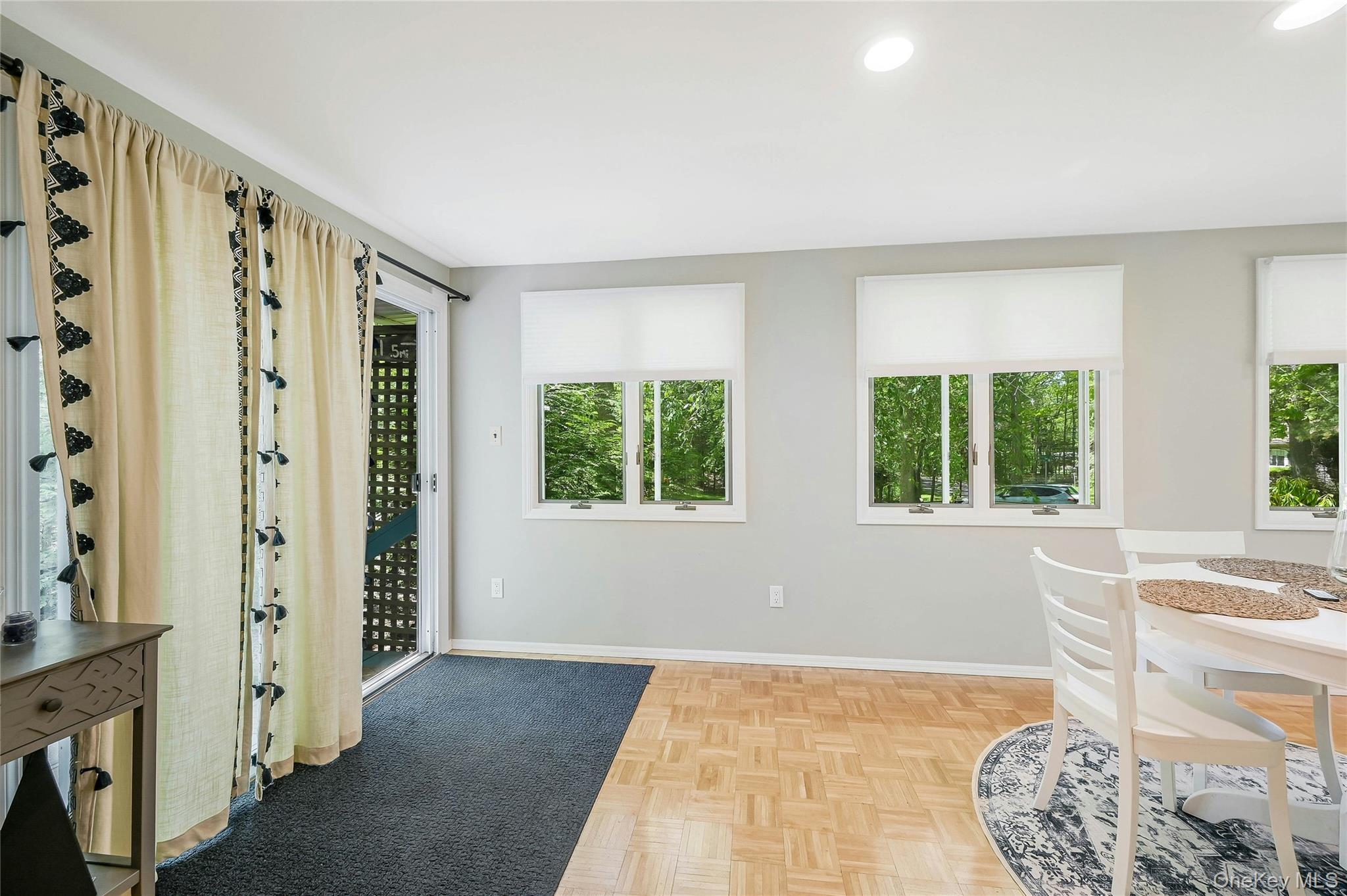340 Pine Road Southold, NY 11971 - Photo 12 of 23 a living room with furniture and a window