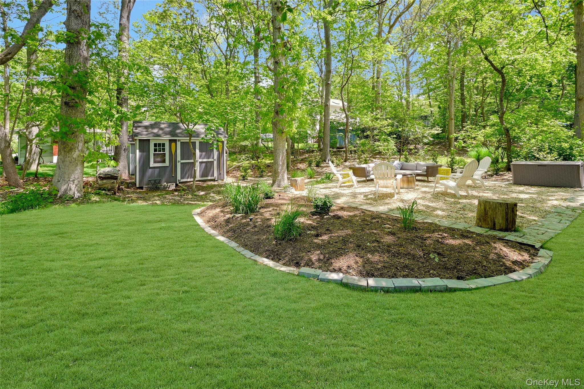 340 Pine Road Southold, NY 11971 - Photo 17 of 23 a view of a house with a backyard