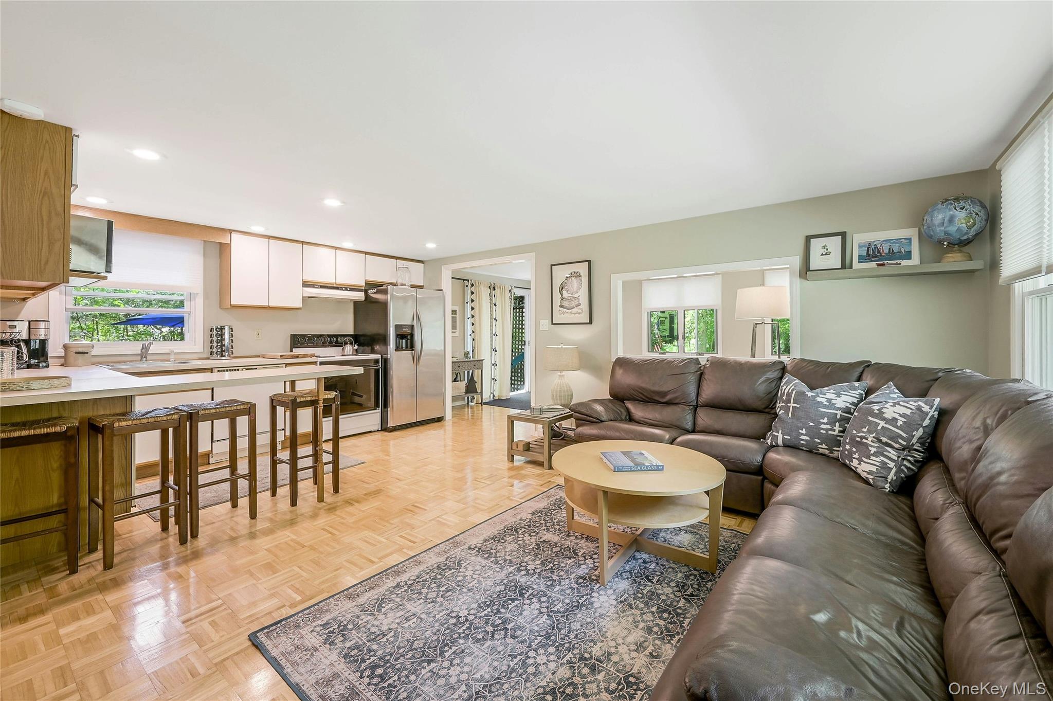 340 Pine Road Southold, NY 11971 - Photo 3 of 23 a living room with furniture and a table