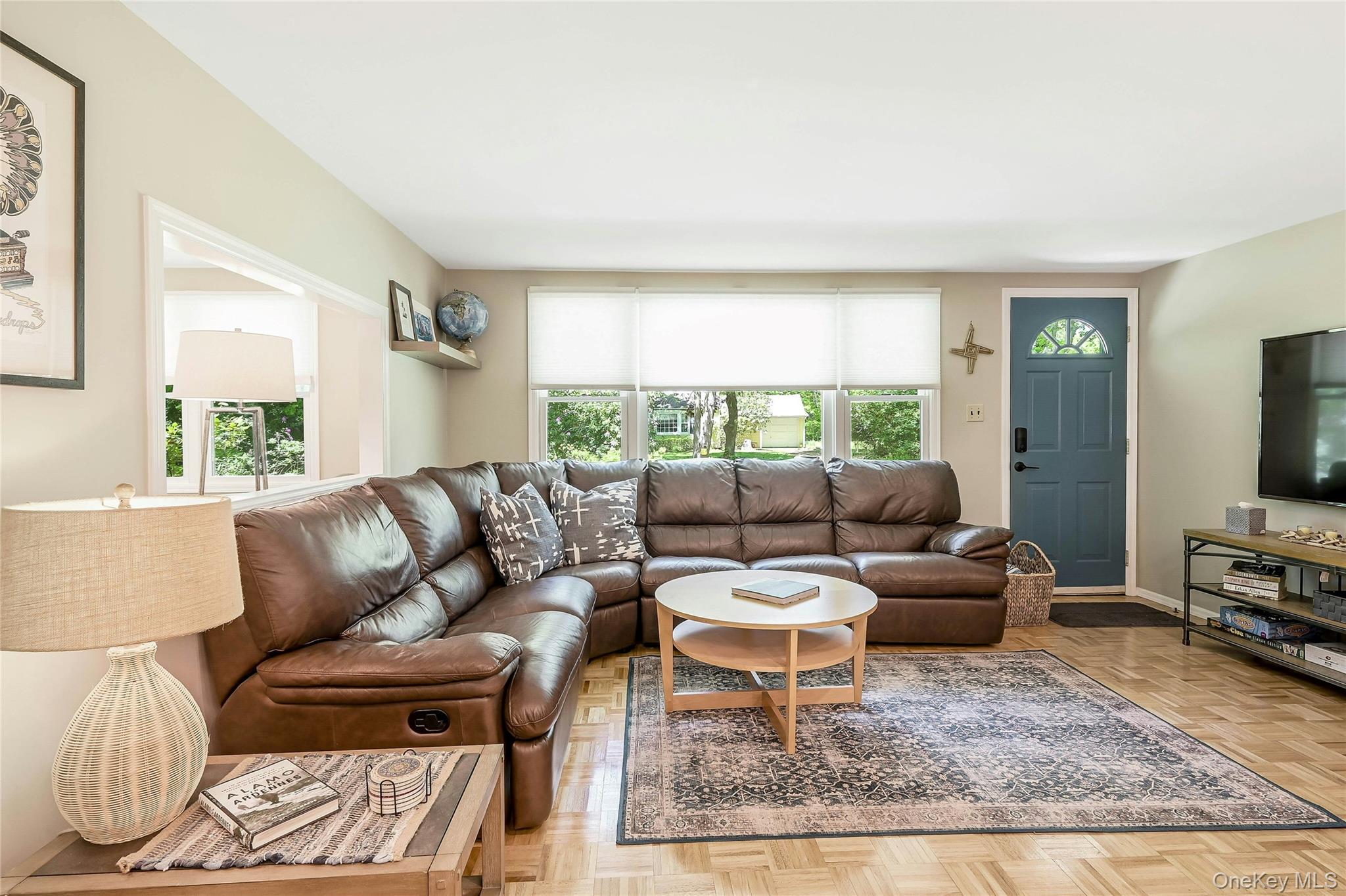 340 Pine Road Southold, NY 11971 - Photo 4 of 23 a living room with furniture and a rug
