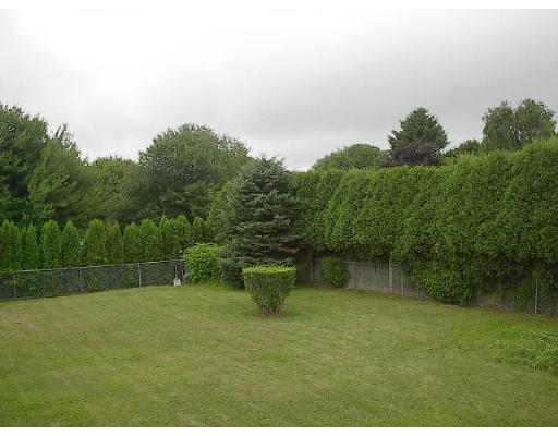715 E Road Tiverton, RI 02878 - Photo 2 of 4 a view of a backyard