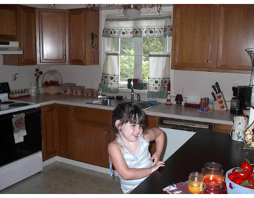 715 E Road Tiverton, RI 02878 - Photo 3 of 4 a kitchen with a sink cabinets and window