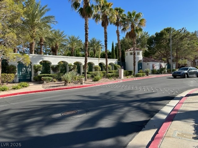 285 Spring Palms Street Henderson, NV 89012 - Photo 25 of 38 View of street with sidewalks and curbs
