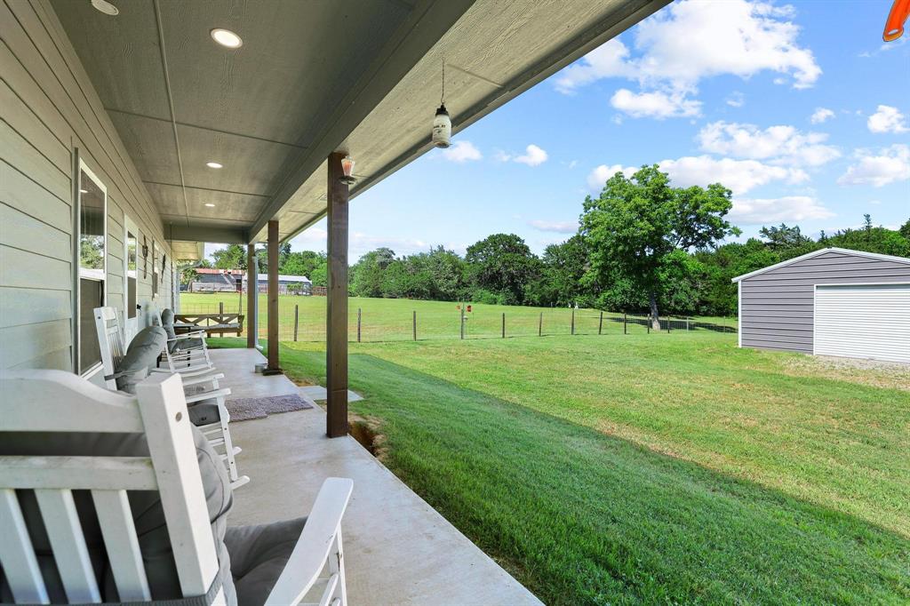 2658 Oak Ridge Road Denison, TX 75021 - Photo 27 of 37 a view of yard with patio