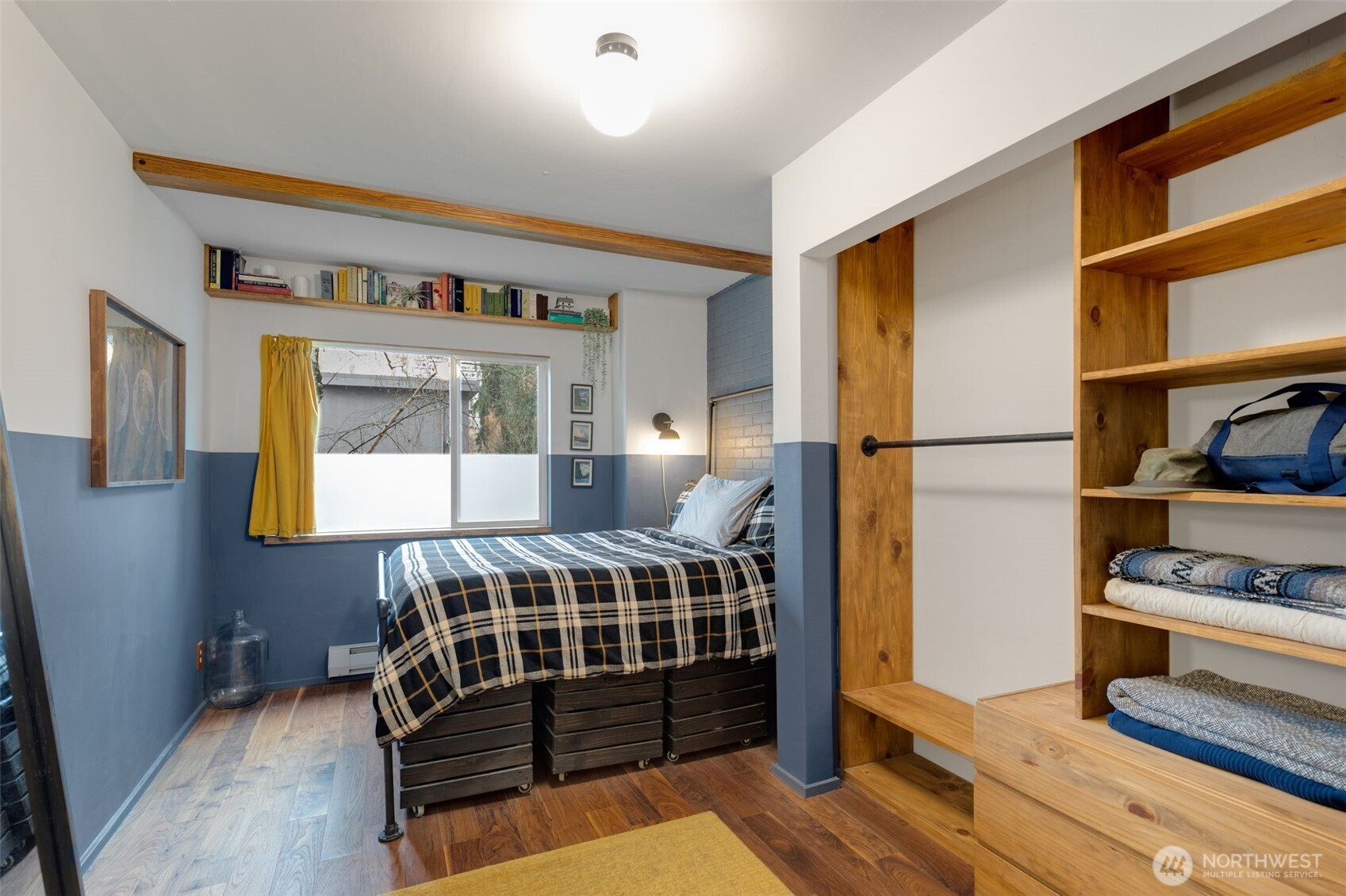 308 East Republican Street, Unit 513 Seattle, WA 98102 - Photo 19 of 40 a bedroom with furniture and a window