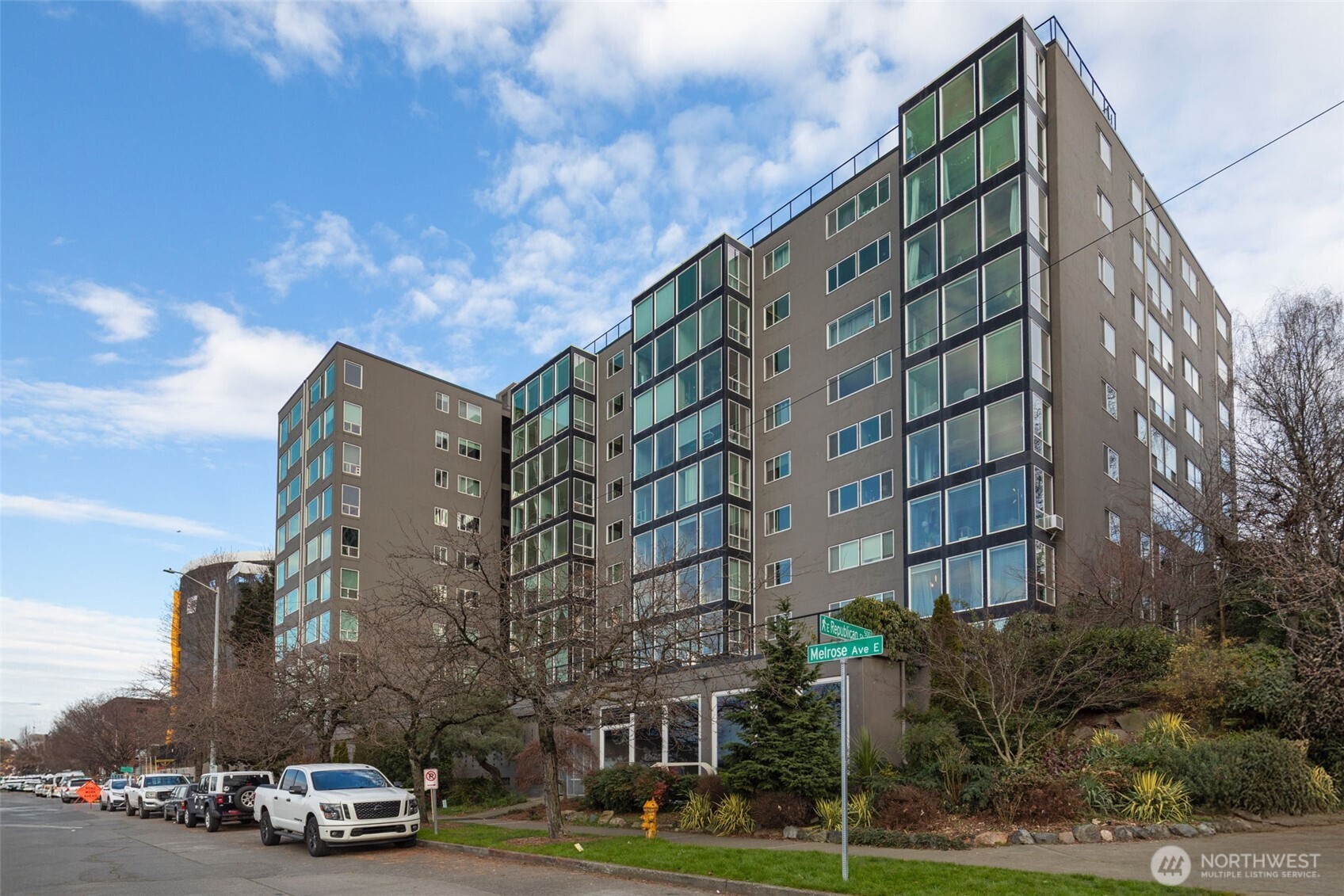 308 East Republican Street, Unit 513 Seattle, WA 98102 - Photo 2 of 40 a car parked in front of a building