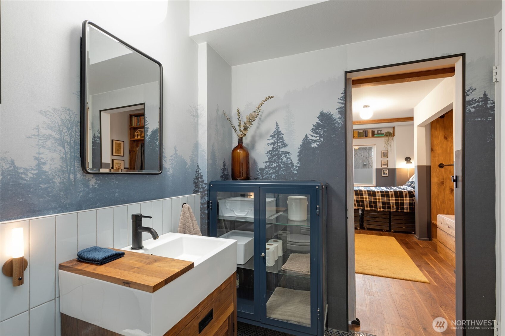 308 East Republican Street, Unit 513 Seattle, WA 98102 - Photo 26 of 40 a view of bathroom with a mirror and a sink