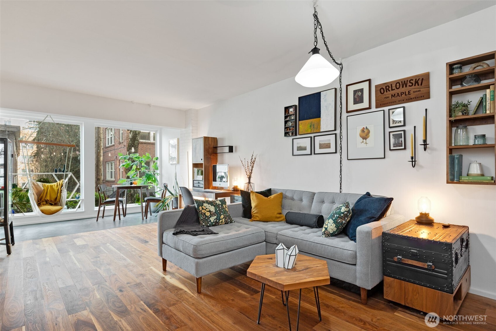 308 East Republican Street, Unit 513 Seattle, WA 98102 - Photo 7 of 40 a living room with furniture and wooden floor