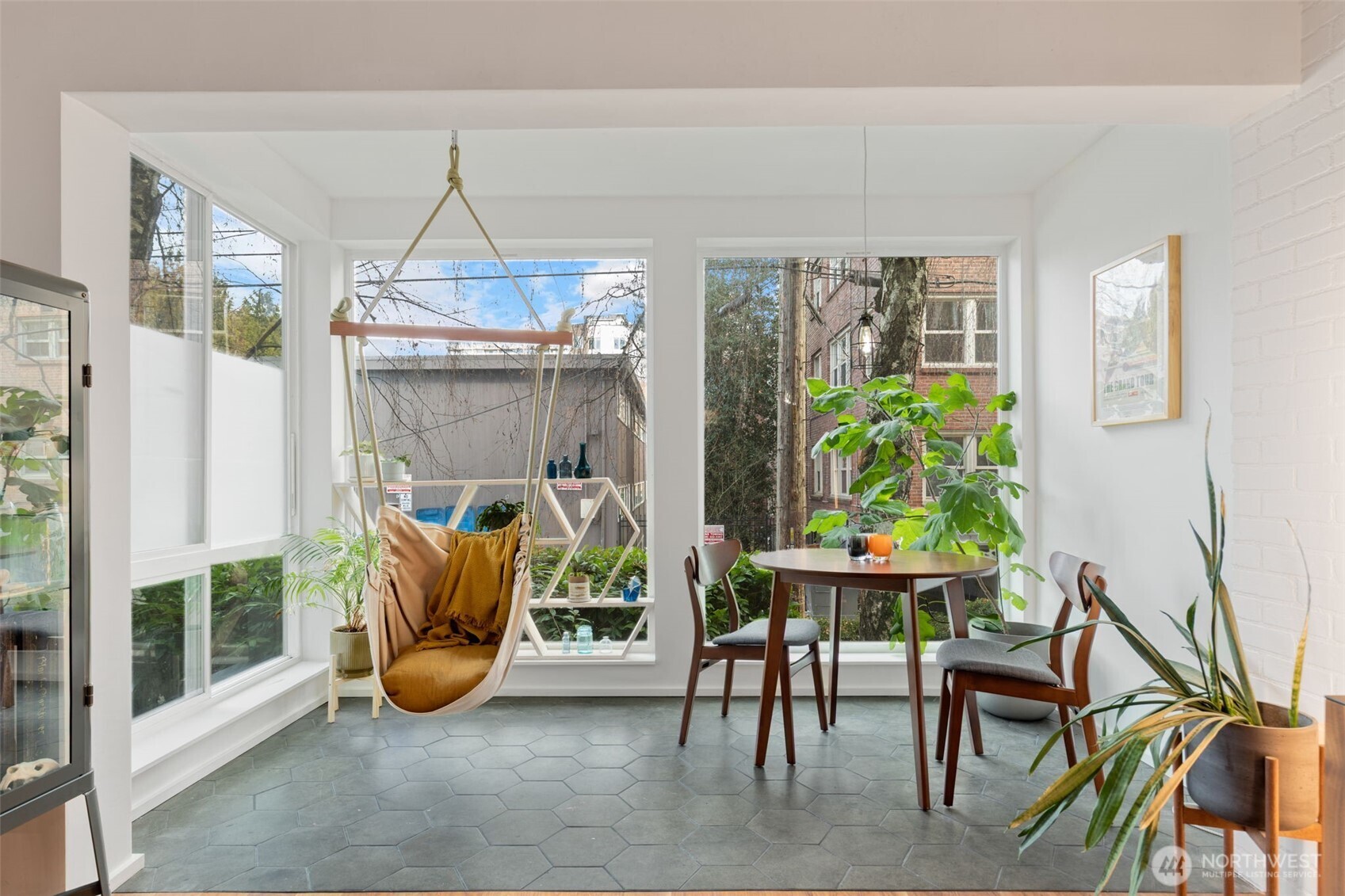 308 East Republican Street, Unit 513 Seattle, WA 98102 - Photo 9 of 40 a view of a dining room with furniture window and outside view