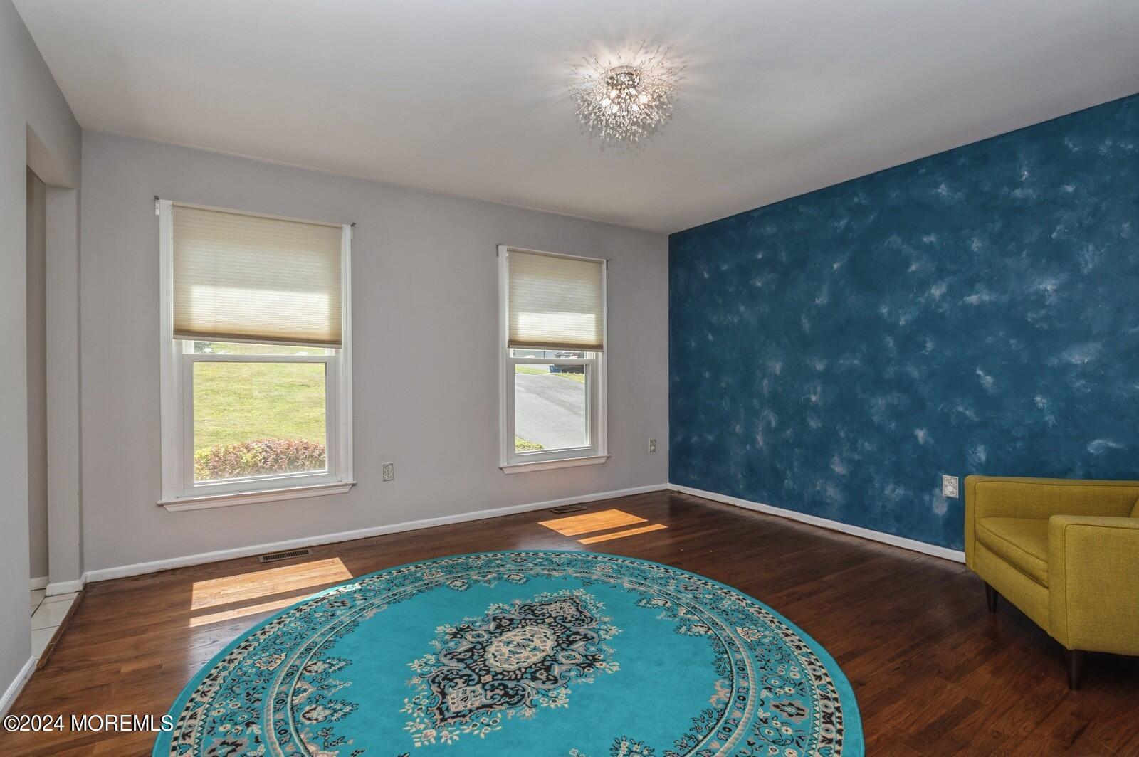 212 Nottingham Road Morganville, NJ 07751 - Photo 11 of 24 a view of an empty room and window