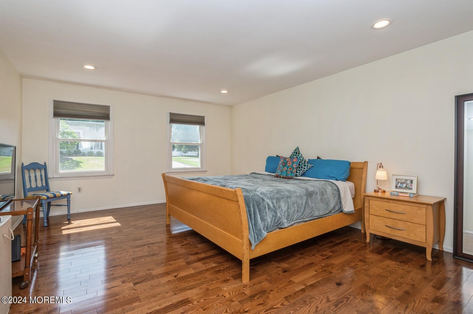 212 Nottingham Road Morganville, NJ 07751 - Photo 15 of 24 a bedroom with a bed and window