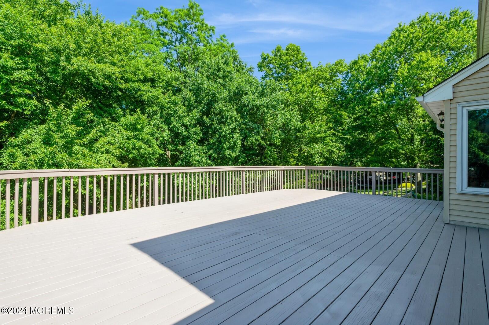 212 Nottingham Road Morganville, NJ 07751 - Photo 23 of 24 a view of a wooden deck
