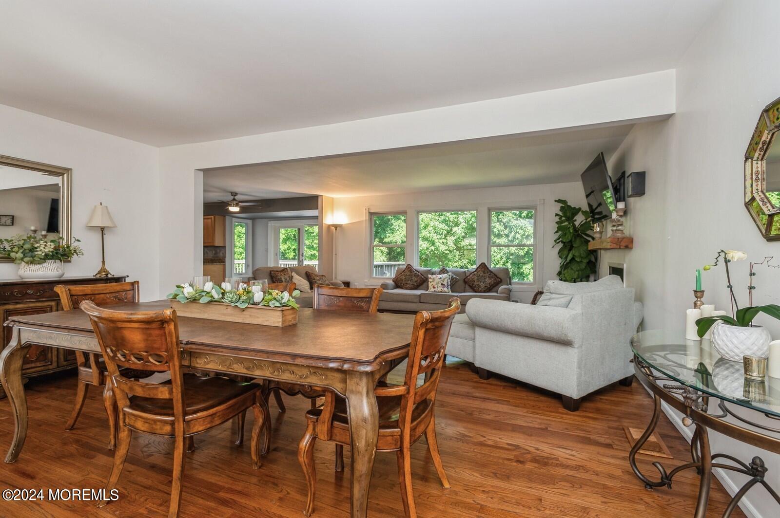 212 Nottingham Road Morganville, NJ 07751 - Photo 6 of 24 a view of a dining room with furniture window and wooden floor