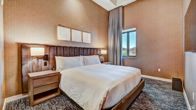 2417 West High Road, Unit 2515 Park City, UT 84098 - Photo 22 of 67 Bedroom featuring baseboards and wallpapered walls